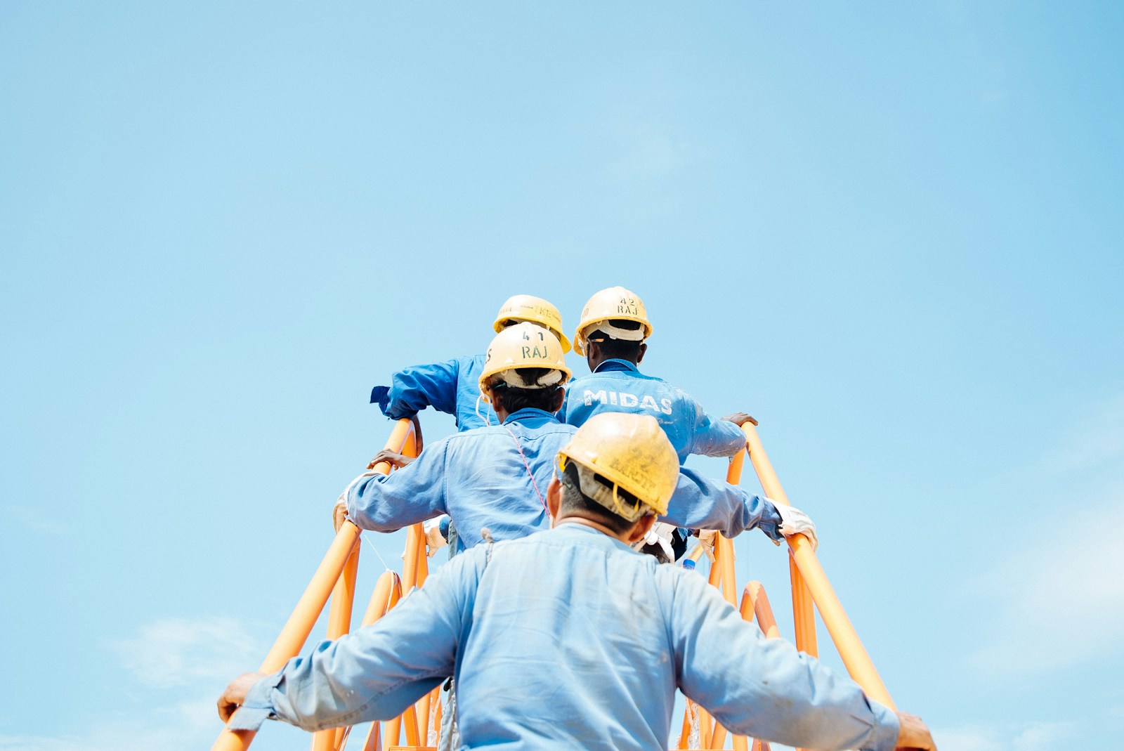 group of person on stairs with contractors insurance